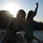 Memorial Day Drunk Fight: Deb and former producer Cassandra dancing on a boat on the lake
