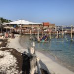 Deb's Vacation To Isla Mujeres: Deb's beach view of people and the water on Isla Mujeres. 