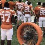 Longhorn Close Up : View from Deb's seats of the DKR stadium of the teams' butts. 