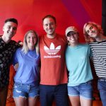 101X-Session with half•alive at Aviator Nation: Half Alive posing with a couple of fans