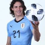 Edinson Cavani: Uruguay Forward: Edinson Cavani: Uruguay Forward holding soccer ball 