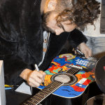 Magic Giant Signing Our Guitar