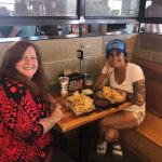 Deb and Mama Dick : Image of Deb with her friend eating chips and salsa. 