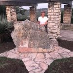 Producer Nick And His Mom Explore Mount Bonnell : Nick's mom in front of a Mount Bonnell sign. 