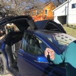 A Closer Look: Jason in front of his new Tesla. 