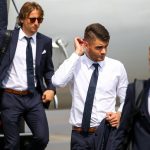 Dulje Ćaleta-Car: Croatia Defender: Dulje Ćaleta-Car: Croatia Defender walking down steps of plane in suit 