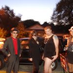 Jason Pimps And Hoes Costume With His Ex Wife And Friend: Jason wearing a dress with his ex-wife and friends who are dressed as pimps and hoes