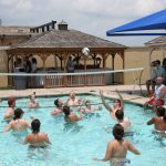Memorial Day Drunk Fight: Jason and Deb playing volleyball with listeners in the Round Rock Express pool