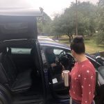 Deb Sees Jason' s Tesla For The First Time: Deb outside viewing Jason's new Tesla. 