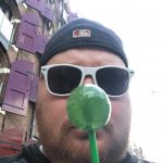 Jason Takes Amsterdam : Jason with an Amsterdam lollipop. 