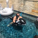 Jason On Killer Whale: Jason on an inflatable killer whale 