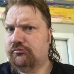 Mullet Man: Jason showing his hair cut unto a mullet 