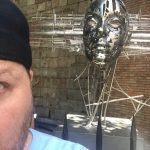 Jason Goes To Barcelona : Jason in front of a statue in Barcelona. 