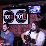 101X-Session With Mt. Joy at Scoot Inn: Mt. Joy with 101X signage in the background