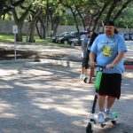 Jason, Deb and Nick Try Out Lime Scooters: Jason hops on a Lime Scooter in the 101X parking lot