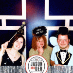 Jason & Deb's Don't Go Downtown NYE Party: group of people posing with props