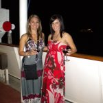 #TBT Bud Light Party Cruise : Deb and former ‘Sorority Intern’ Cassandra at the Bahamas Bud Light Party Cruise from 2009 with dressed in the night in front of a boat. 