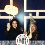 Jason & Deb's Don't Go Downtown NYE Party: two women posing using new years eve props