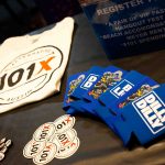 The 101X Day Party during SXSW-Day 1: 101X Merchandise including sticker, pins and shirts, Bud Light koozies that say 