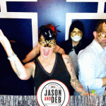 Jason & Deb's Don't Go Downtown NYE Party: group of people posing with masquerade masks on 