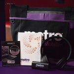 The 101X Day Party during SXSW-Day 1: Metro By T-Mobile Prize bag including headphones, notebook, portable charger, and a laptop camera cover
