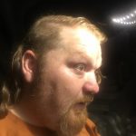 One Side: Jason cutting his hair into a mullet. 