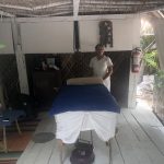 Deb's Vacation To Isla Mujeres: #BestMassageEver : An employee and massage hut on Isla Mujeres. 