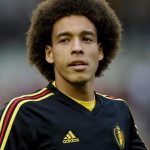 Axel Witsel: Belgium Midfielder: Axel Witsel: Belgium Midfielder on field in Belgium team jersey 