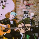 101X-Session with Dreamers: Dreamers playing guitar