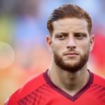 Fakhreddine Ben Youssef: Tunisia Forward: Fakhreddine Ben Youssef: Tunisia Forward staring in the field 