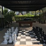 Nick In Mexico: a giant-sized chess board at the resort beach hotel