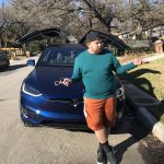 Are Those Butterfly Doors?: Jason in front of his new Tesla. 