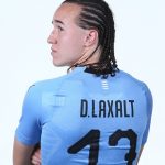 Diego Laxalt: Uruguay Midfielder: Diego Laxalt: Uruguay Midfielder from the back FIFA world cup head shots showing off his jersey 
