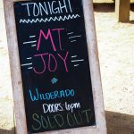 101X-Session With Mt. Joy at Scoot Inn: Sign reading: 