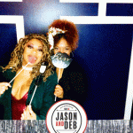 Jason & Deb's Don't Go Downtown NYE Party: two women posing using new years eve props