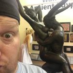 Jason Goes To Barcelona : Jason in front of a statue in Barcelona. 