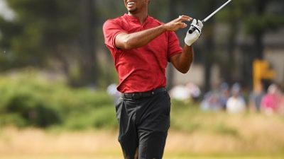 Tiger Woods in British Open swinging a golf club