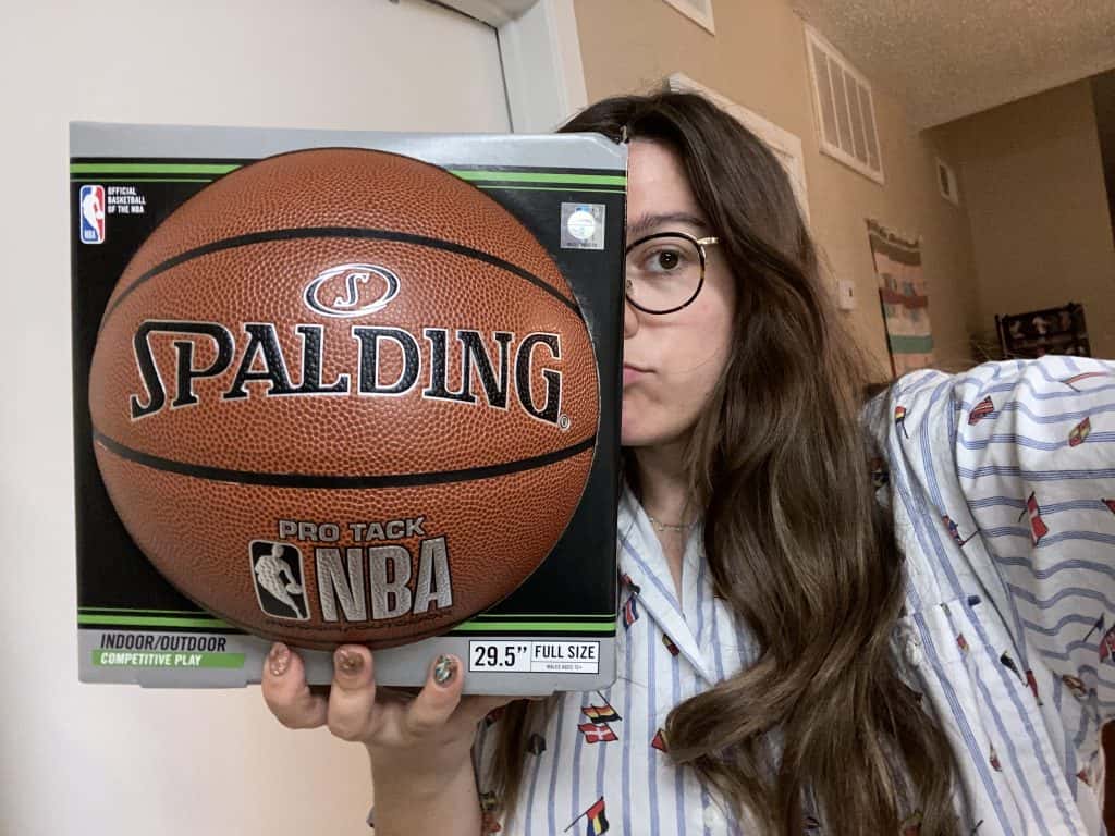 Katy holding a basketball