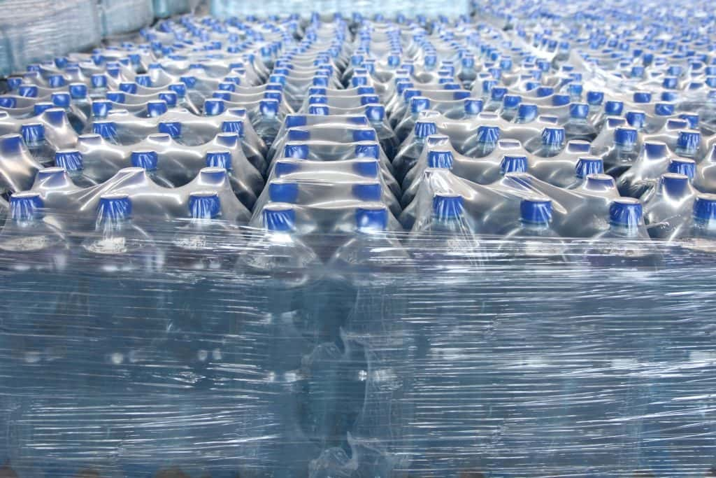 Image of water bottles wrapped in plastic from Shutter stock images.