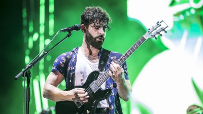 Yannis Philippakis of Foals on stage