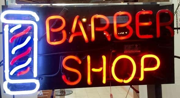 Neon sign of Barber Shop in the window