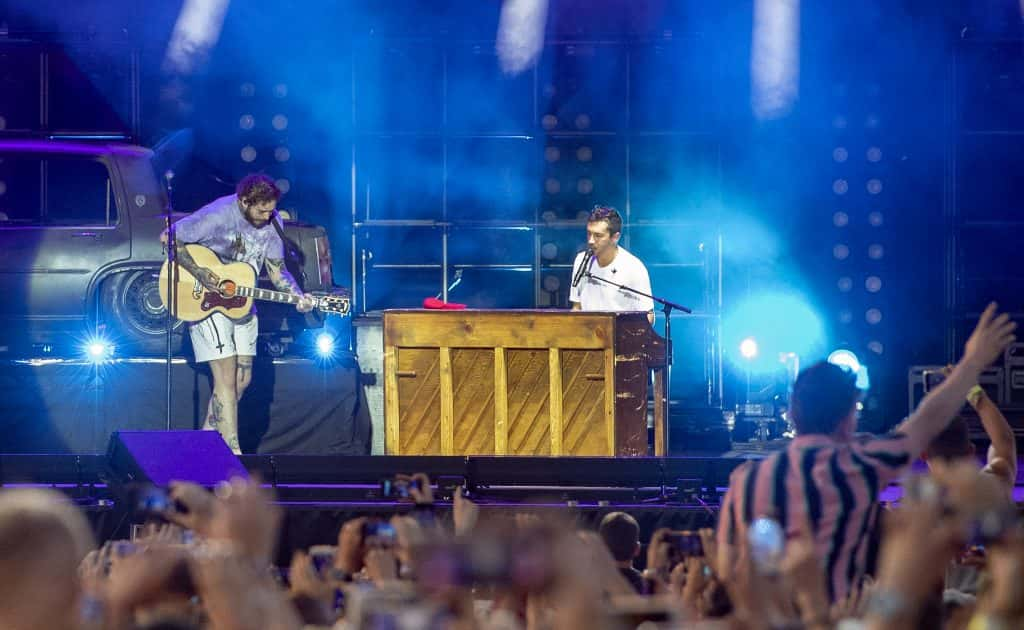 Post Malone joins Twenty One Pilots on stage during Leeds Festival 2019 at Bramham Park on August 25, 2019 in Leeds, England.