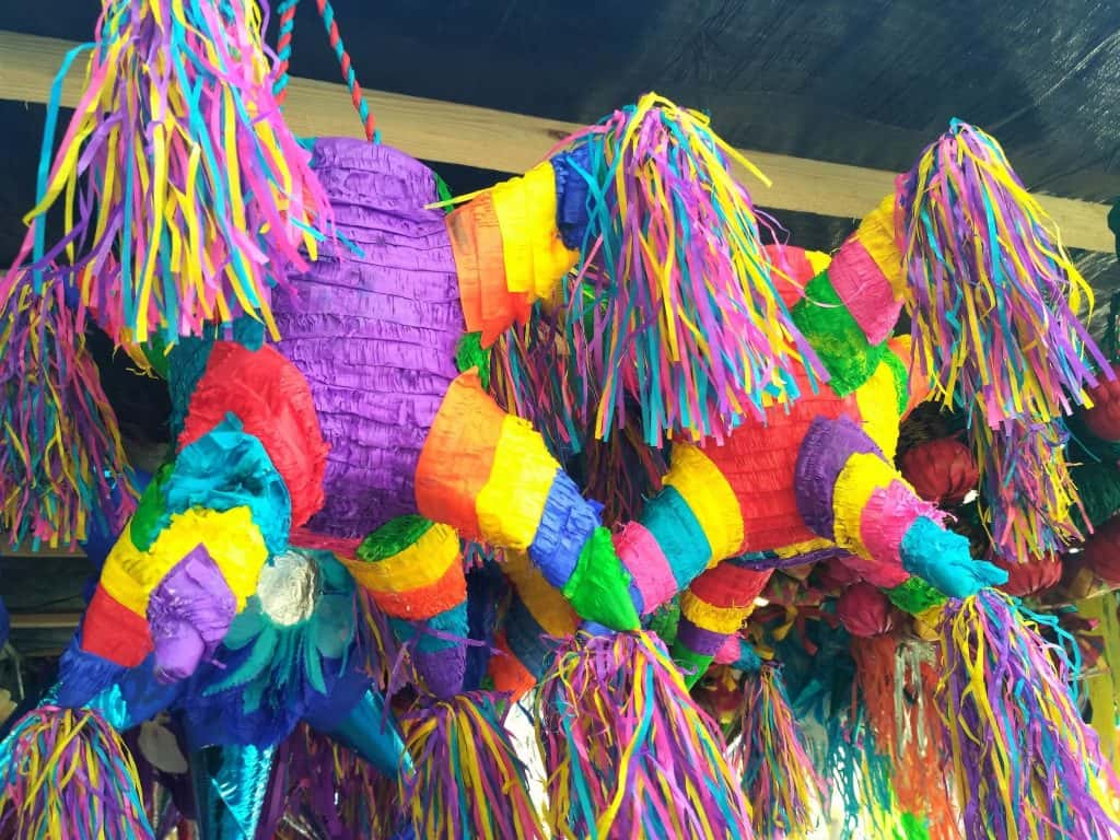 Two colorful confetti pinatas in Mexico City.