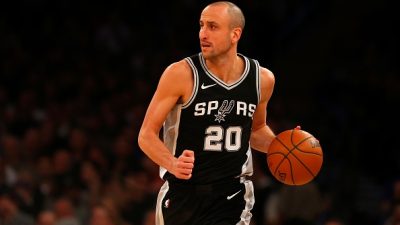 Manu Ginobili #20 of the San Antonio Spurs in action against the New York Knicks at Madison Square Garden