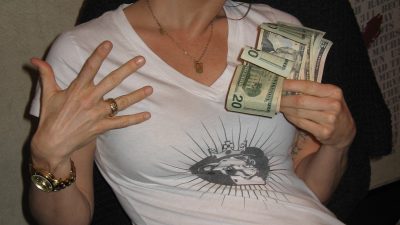 Deb holding Lots of money