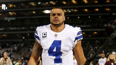 dak prescott on the field in cowboys jersey