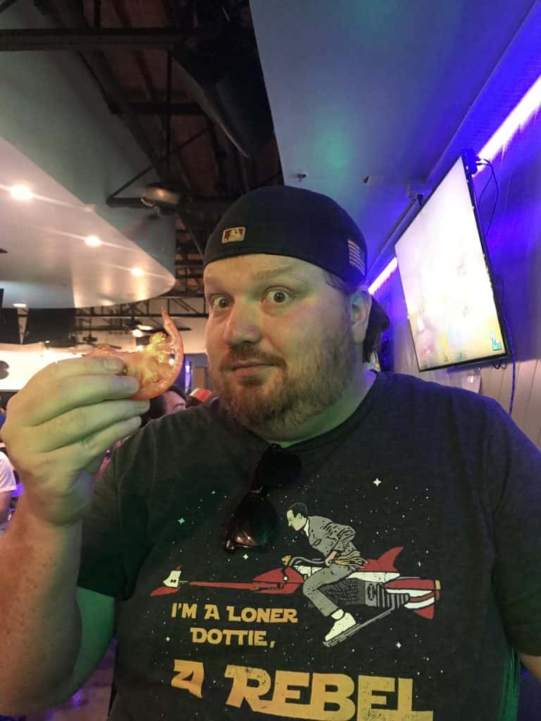 Jason holding a tomato