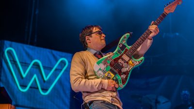 This is Rivers Cuomo, frontman for Weezer, performing at Austin360 Amphitheater.