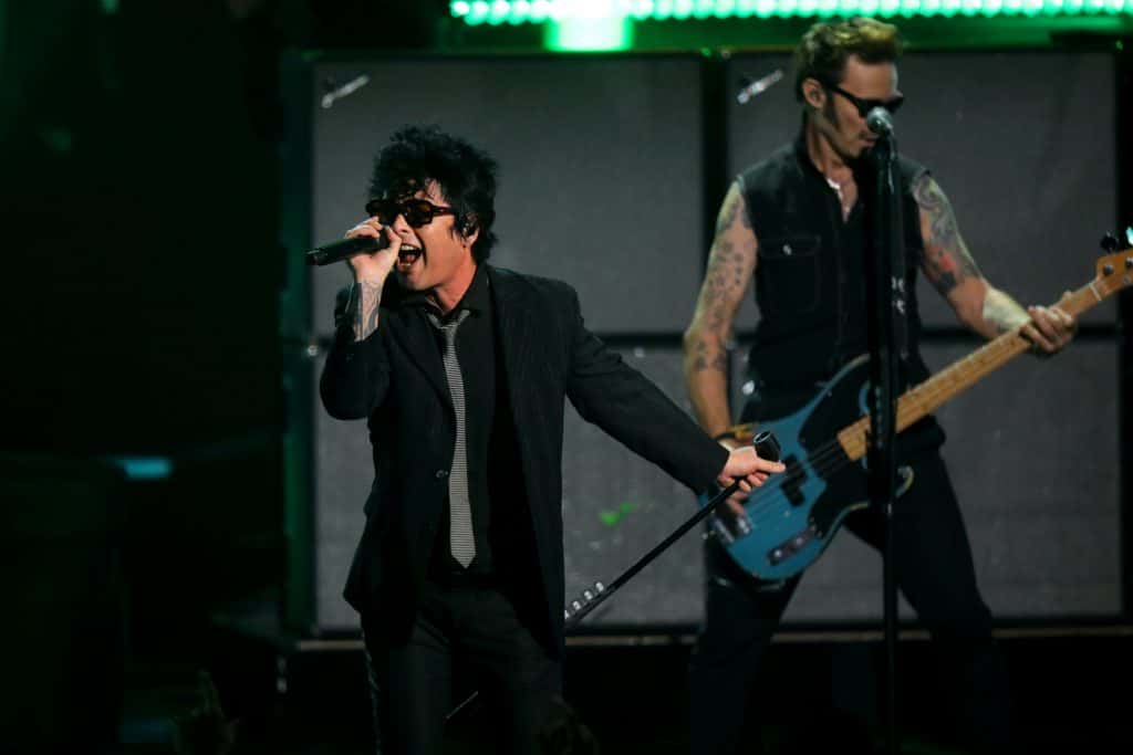 Billie Joe Armstrong, Jakob Armstrong, Joey Armstrong, Mike Dirnt, and Tre Cool of Green Day performs onstage during The Game A
