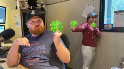 Jason and Deb flippin off each other censored with shamrocks